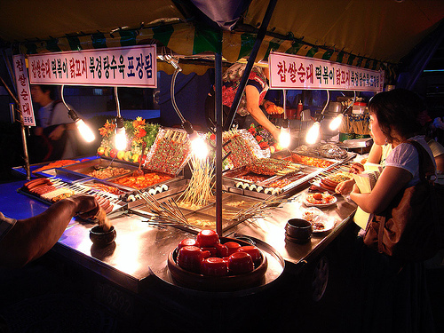 A Pojangmacha style street-food tent. These tent set-ups are prominent in areas of Seoul, South Korea, particularly districts like Hongdae and Myeongdong. [Photo Credit: Google Images]